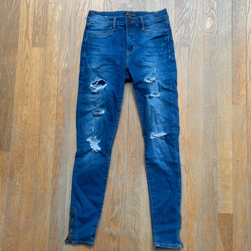 High waisted dark washed ripped jegging‘s